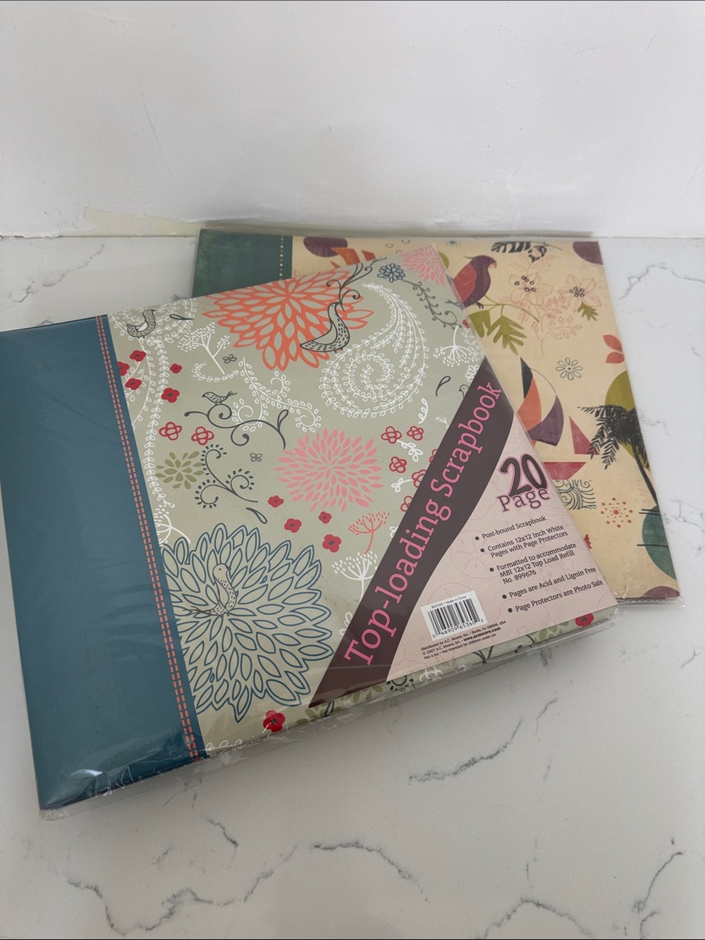 Two top loading scrapbooks